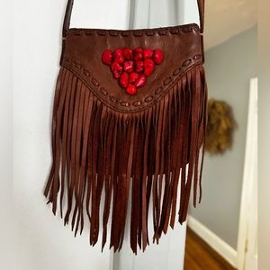 Brown 100% leather Lucky Brand purse.